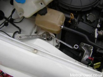 tighten up the bolt with the 13mm and 15mm spanners