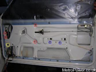 red circles showing new locations for electric window mechanism