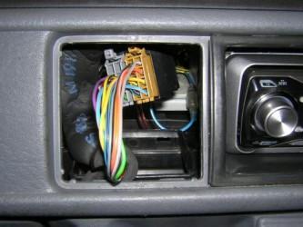 radio wiring harness pulled around side of vent